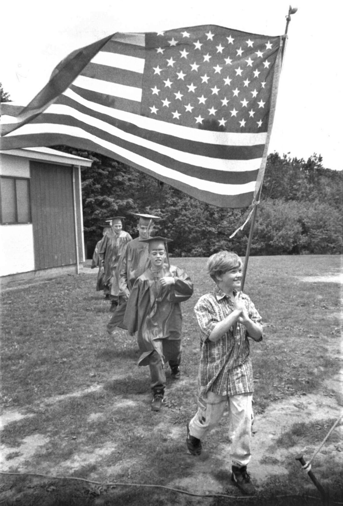 Graduates of Savoy Elementary School look toward the future with bright eyes. June 12, 1995